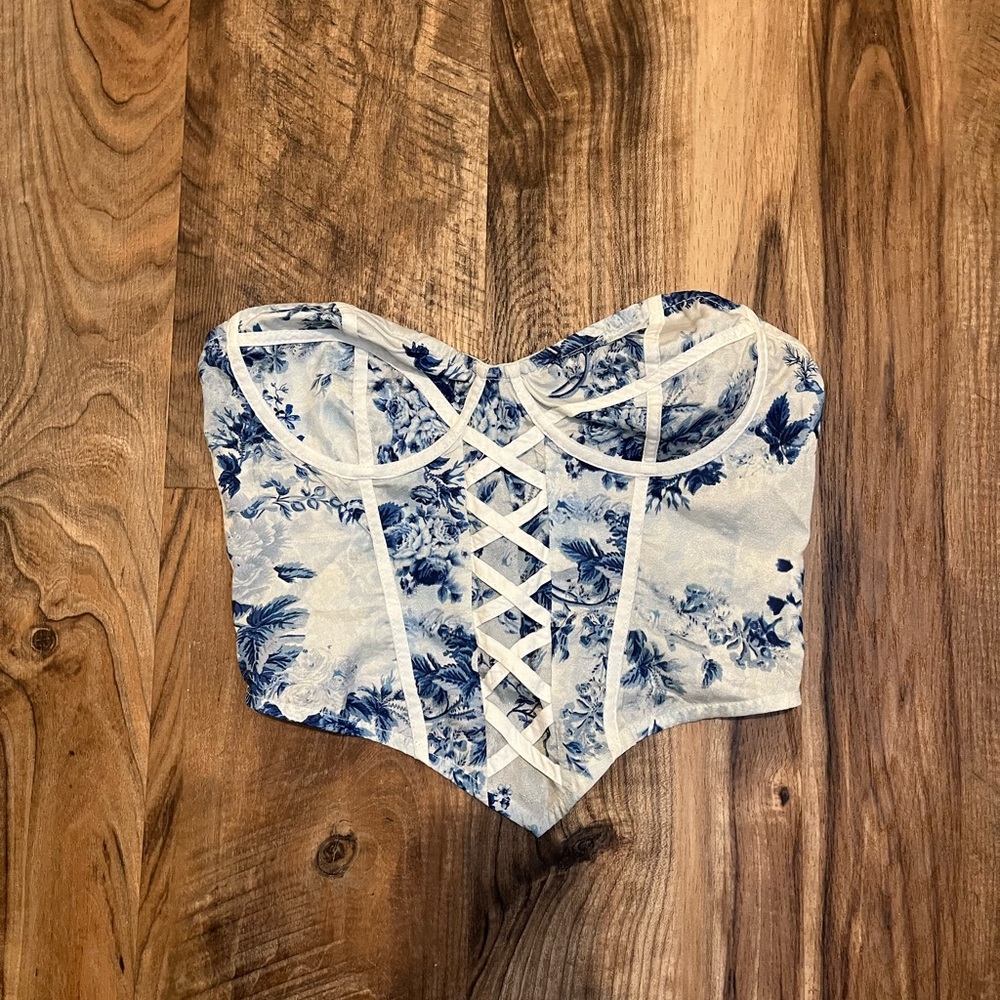 Pretty Little Thing. Strapless crop top. Blue/white floral pattern. Size small.